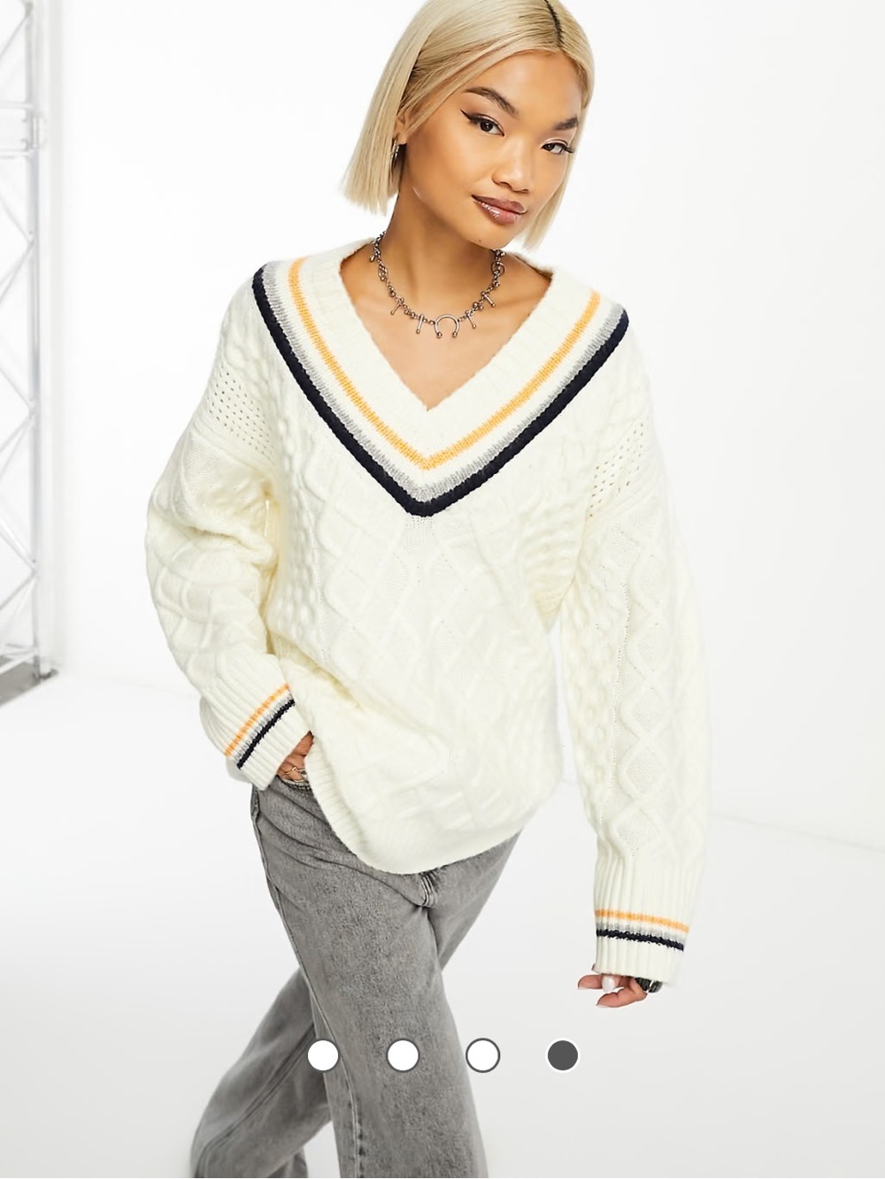 ASOS DESIGN oversized cream cable-knit sweater featuring a deep V-neck